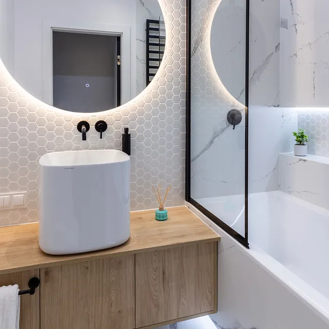 Bathroom installation and design. Bath tub and sink.